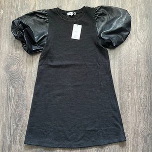 Black tshirt dress with pleather sleeves.